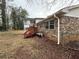Brick house exterior with a wooden deck and air conditioning units at 2289 Aurie Dr, Decatur, GA 30034