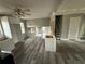 Kitchen with white cabinets and gray vinyl flooring at 2289 Aurie Dr, Decatur, GA 30034