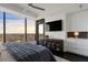 Elegant bedroom with a large bed and city views at 3630 Peachtree Ne Rd # 2104, Atlanta, GA 30326