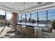 Modern conference room with city view and large table at 3630 Peachtree Ne Rd # 2104, Atlanta, GA 30326