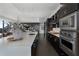 Modern kitchen with stainless steel appliances and marble countertops at 3630 Peachtree Ne Rd # 2104, Atlanta, GA 30326