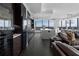 Open concept kitchen features an island, wine storage, and floor-to-ceiling windows with panoramic views at 3630 Peachtree Ne Rd # 2104, Atlanta, GA 30326