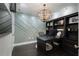 Home office featuring modern wall decor, custom built-ins and a stylish light fixture at 3630 Peachtree Ne Rd # 2104, Atlanta, GA 30326