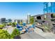 Rooftop patio features a fireplace, seating, and city views at 3630 Peachtree Ne Rd # 2104, Atlanta, GA 30326