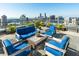 Relaxing rooftop patio with comfortable seating and city views at 3630 Peachtree Ne Rd # 2104, Atlanta, GA 30326