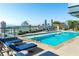 Rooftop pool area with comfortable lounge chairs and city views at 3630 Peachtree Ne Rd # 2104, Atlanta, GA 30326