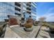 Cozy rooftop patio with fire pit and seating at 3630 Peachtree Ne Rd # 2104, Atlanta, GA 30326
