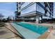 Large rooftop pool with city views and lounge chairs at 3630 Peachtree Ne Rd # 2104, Atlanta, GA 30326