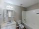 Clean bathroom with shower/tub combo and vanity at 5370 Biffle Ln, Stone Mountain, GA 30088