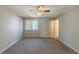 Bedroom with ceiling fan and window at 5370 Biffle Ln, Stone Mountain, GA 30088