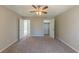 Bright bedroom with closets and ceiling fan at 5370 Biffle Ln, Stone Mountain, GA 30088