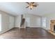Spacious living room with hardwood floors, fireplace and high ceilings at 5370 Biffle Ln, Stone Mountain, GA 30088