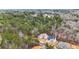Aerial view of a neighborhood featuring new construction homes nestled among lush greenery at 4271 Matisse Ln, Fairburn, GA 30213