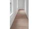 Hallway with newly refinished hardwood floors at 4271 Matisse Ln, Fairburn, GA 30213