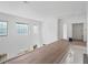 Second floor loft area with high ceilings and natural light streaming through the windows at 4271 Matisse Ln, Fairburn, GA 30213
