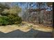 Spacious backyard with wooded backdrop at 125 Lamberth Lake Dr, Fayetteville, GA 30215