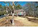 Two-story house with a large yard and mature trees at 125 Lamberth Lake Dr, Fayetteville, GA 30215
