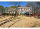Two-story brick home with a large front yard at 125 Lamberth Lake Dr, Fayetteville, GA 30215