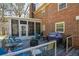 Relaxing patio with seating and fire pit area at 125 Lamberth Lake Dr, Fayetteville, GA 30215