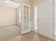 Bright entryway with tiled floor and French doors to office at 3348 Chastain Gardens Nw Dr, Kennesaw, GA 30144