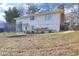 Spacious backyard with trampoline and partial view of home at 830 Forrest St, Roswell, GA 30075