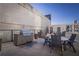 Outdoor grilling area with seating for residents at 1280 W Peachtree Nw St # 2207, Atlanta, GA 30309