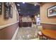 Community bar with seating and a marble floor at 1280 W Peachtree Nw St # 2207, Atlanta, GA 30309