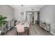 Elegant dining room featuring a marble table and pink chairs at 1280 W Peachtree Nw St # 2207, Atlanta, GA 30309
