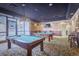 Game room with two billiard tables and a bar area at 1280 W Peachtree Nw St # 2207, Atlanta, GA 30309