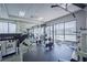 Modern gym with Cybex machines and window views at 1280 W Peachtree Nw St # 2207, Atlanta, GA 30309