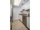 Modern kitchen with granite countertops and stainless steel appliances at 1280 W Peachtree Nw St # 2207, Atlanta, GA 30309