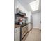 Modern kitchen with granite countertops and stainless steel appliances at 1280 W Peachtree Nw St # 2207, Atlanta, GA 30309
