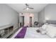 Bright bedroom with king-size bed and access to bathroom at 1280 W Peachtree Nw St # 2207, Atlanta, GA 30309