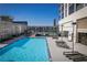 Resort-style pool with plenty of lounge chairs at 1280 W Peachtree Nw St # 2207, Atlanta, GA 30309