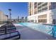 Inviting rooftop pool with plenty of lounge chairs at 1280 W Peachtree Nw St # 2207, Atlanta, GA 30309