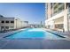 Inviting rooftop pool with plenty of lounge chairs at 1280 W Peachtree Nw St # 2207, Atlanta, GA 30309