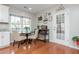 Cozy breakfast nook with built-in shelving and French doors at 1240 Cottonwood Trl, Cumming, GA 30041