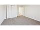 Charming bedroom with bifold doors, new carpet, and natural light at 245 London Ln, Hiram, GA 30141