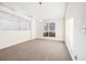 Bright dining room with a modern chandelier and a large window at 245 London Ln, Hiram, GA 30141