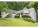 Well-maintained home with manicured landscaping and lush green lawn at 245 London Ln, Hiram, GA 30141