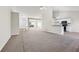 Open concept living room showing kitchen, foyer, dining, and living spaces at 245 London Ln, Hiram, GA 30141