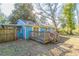 Charming home with a spacious deck, wooden steps, and fenced backyard at 3024 Catalina Dr, Decatur, GA 30032