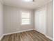 Bright bedroom with wood-look floors and ample closet space at 3024 Catalina Dr, Decatur, GA 30032
