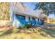 Side view of a blue house with a fenced yard at 3024 Catalina Dr, Decatur, GA 30032