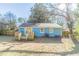 Blue house exterior with wooden deck and fenced yard at 3024 Catalina Dr, Decatur, GA 30032