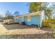 Back of house, blue exterior, wooden deck, fenced yard at 3024 Catalina Dr, Decatur, GA 30032