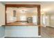 Open concept kitchen with a breakfast bar and wood accents at 3024 Catalina Dr, Decatur, GA 30032