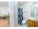 Small bathroom with shower and toilet at 3251 Hunters Crossing Pt, Lithonia, GA 30038