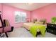 Bedroom with a queen bed and pink walls at 3251 Hunters Crossing Pt, Lithonia, GA 30038