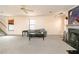 Living room with fireplace and ceiling fan at 3251 Hunters Crossing Pt, Lithonia, GA 30038